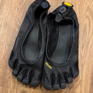 Vibram Black Toe Shoes with Yellow Logo